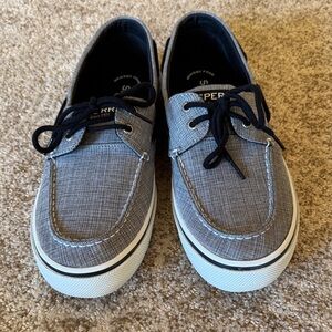 Sperry brand new gray canvas slip on boat shoes with black ties.